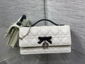 D*or 26 Bow Pearl Chain Clutch Two Tone White Black Lambskin SHW