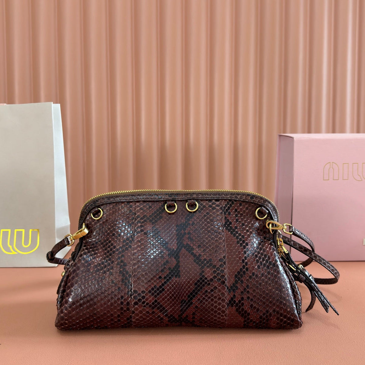 M*u Caprice Clutch 28 Dark Brown in Snakeskin
