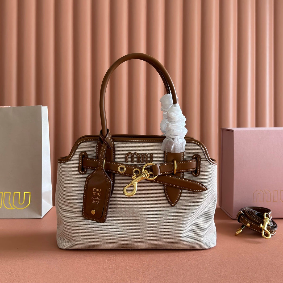M*u*M*u Aventure Handbag 31 Beige in Canvas