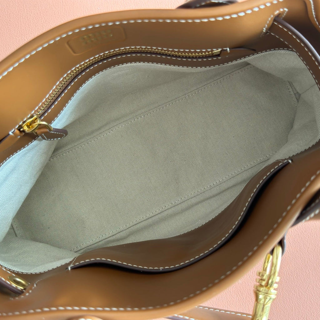 M*u*M*u Aventure Handbag 31 Beige in Canvas