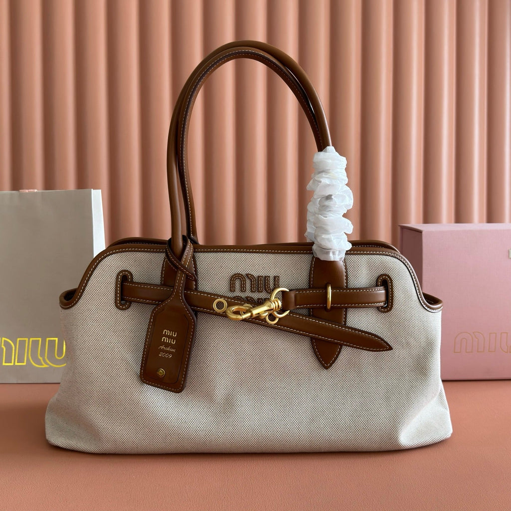 M*u*M*u Aventure Handbag 44 Beige in Canvas