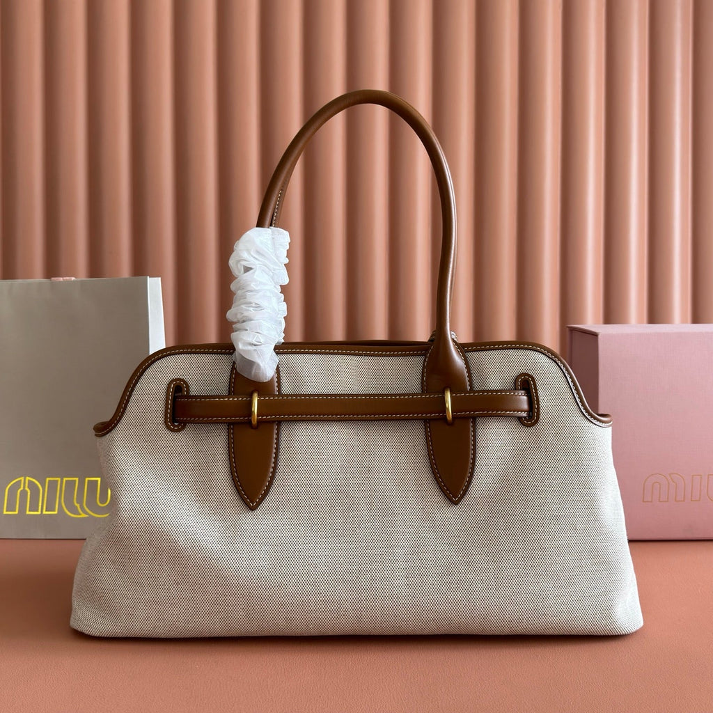 M*u*M*u Aventure Handbag 44 Beige in Canvas