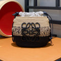 L*E 18 ANAGRAM BASKET BAG IN BLACK AND NATURAL RAFFIA