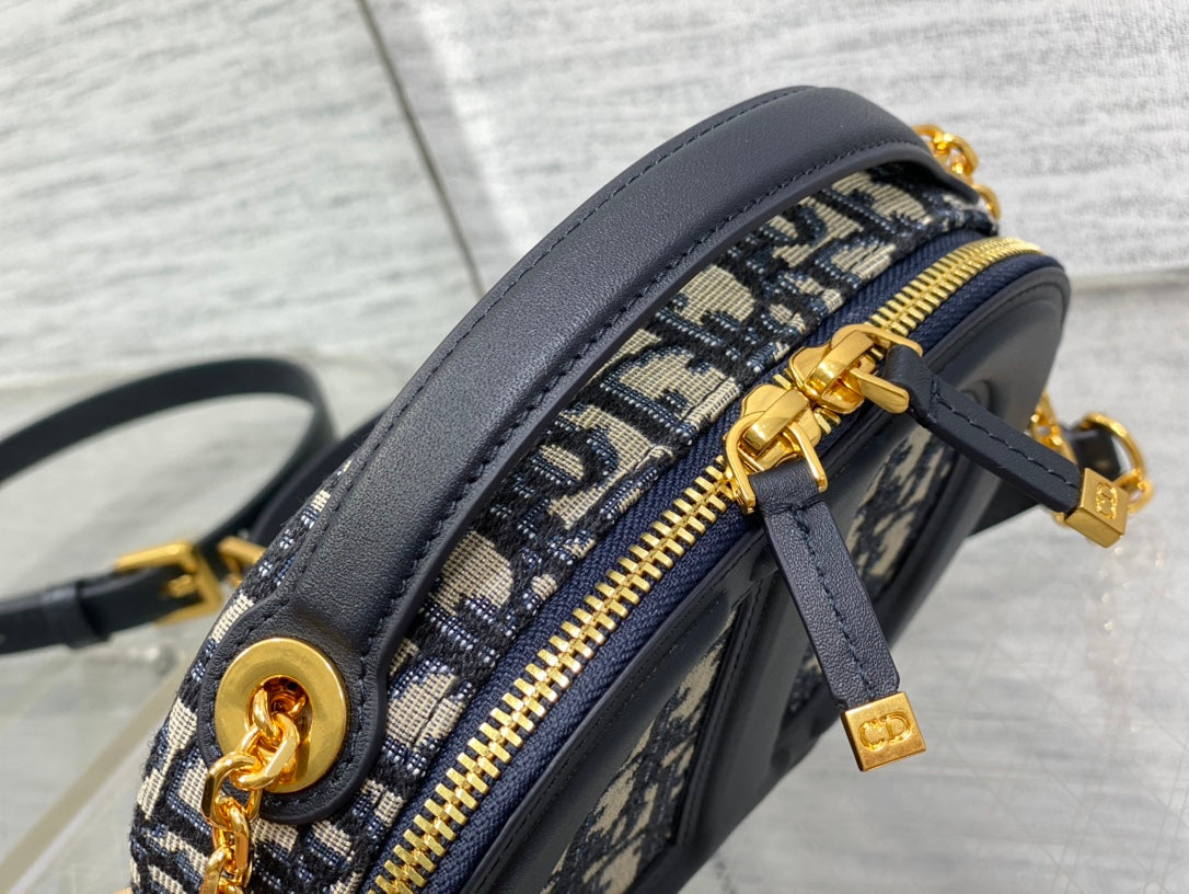 C*D Oval camera bag 18 blue monogram cowhide leather