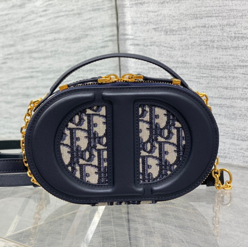 C*D Oval camera bag 18 blue monogram cowhide leather