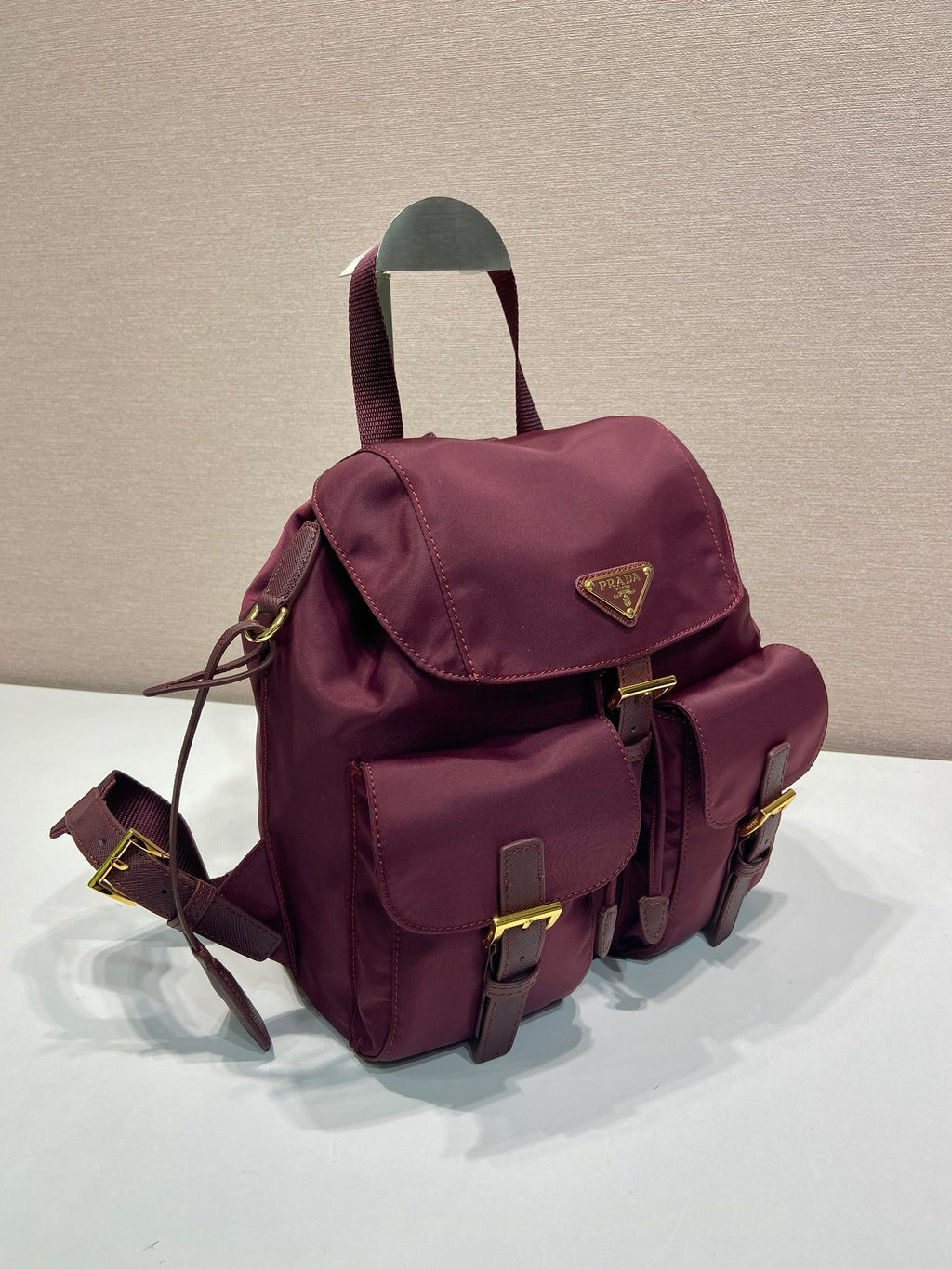 Pr*a backpack 28 burgundy nylon fabric gold hardware