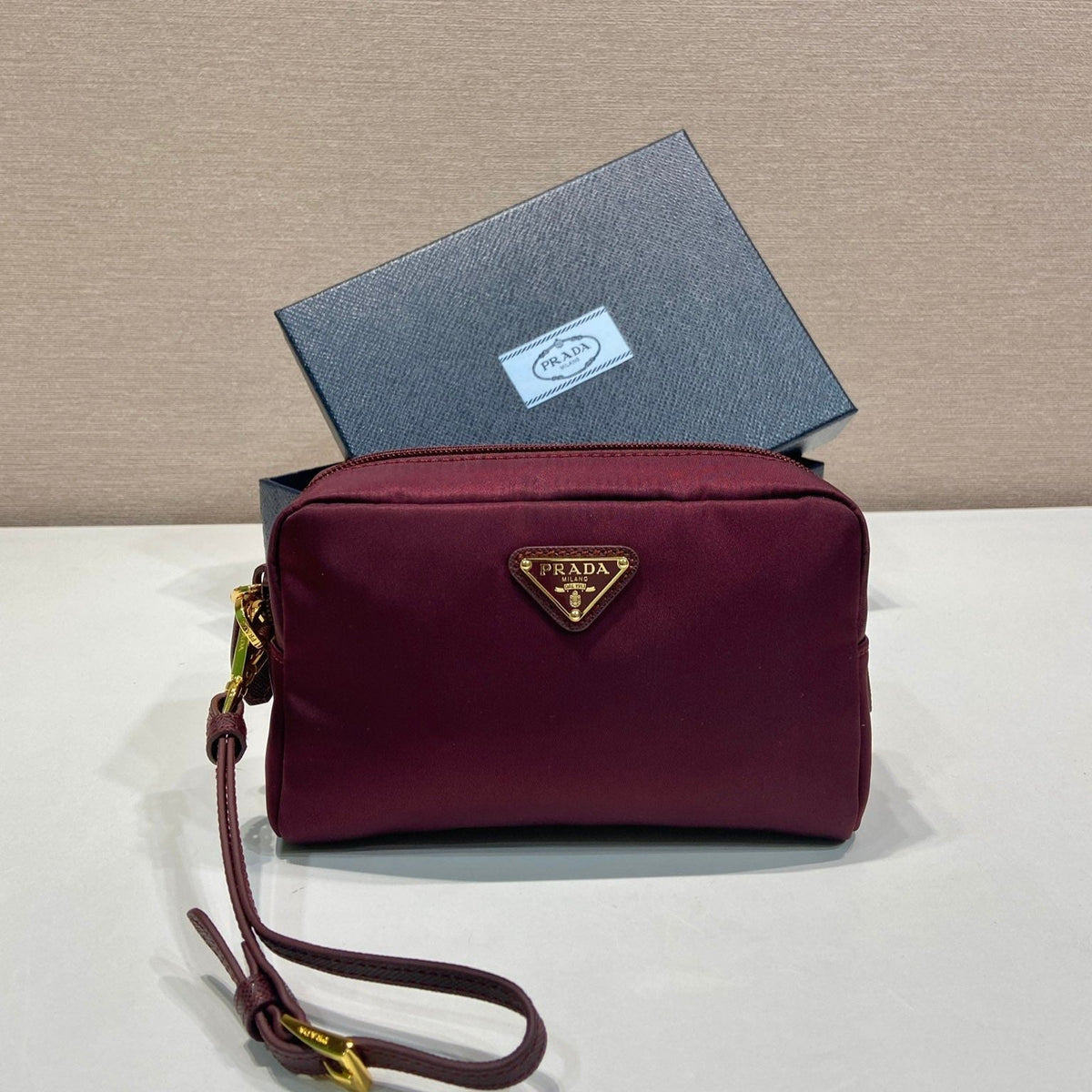 Pr*a clutch large 17 burgundy nylon fabric