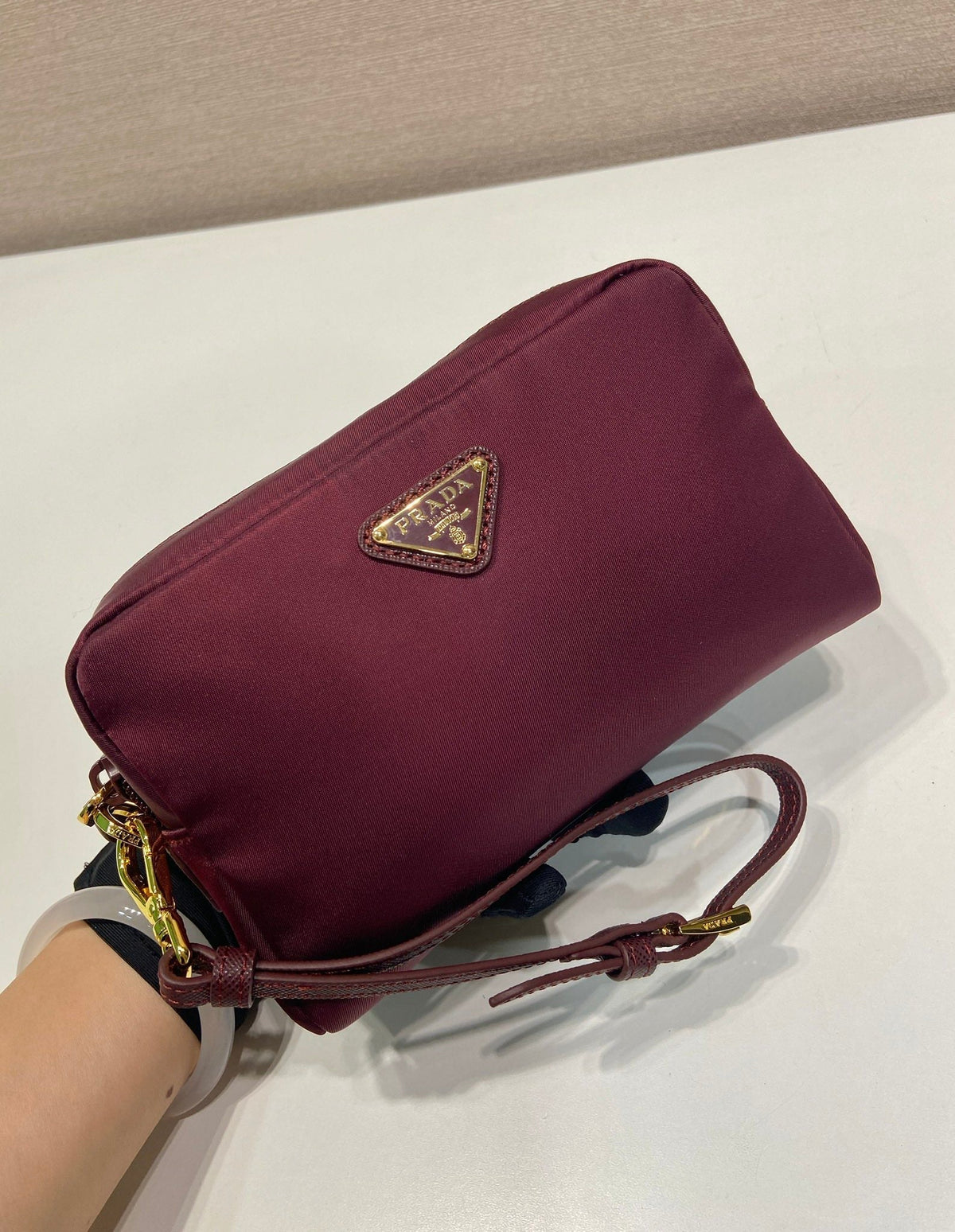 Pr*a clutch large 17 burgundy nylon fabric