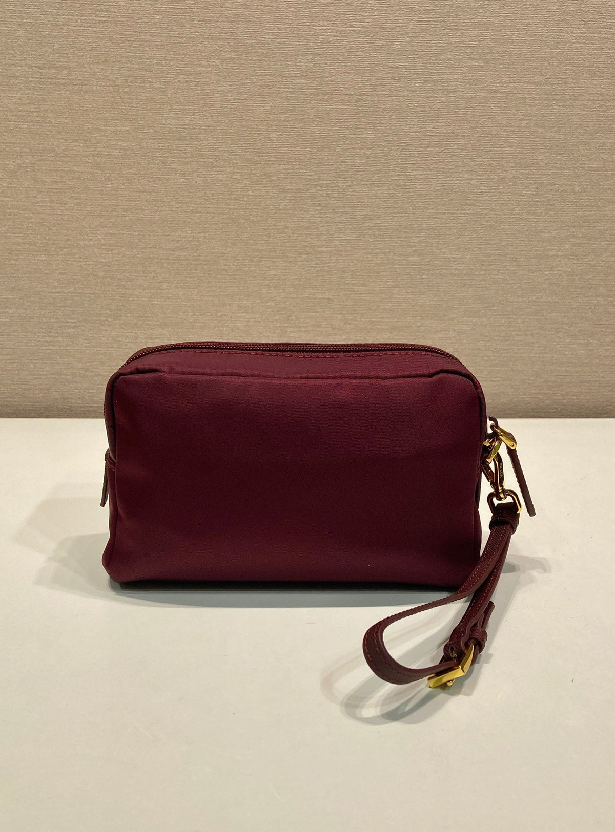Pr*a clutch large 17 burgundy nylon fabric