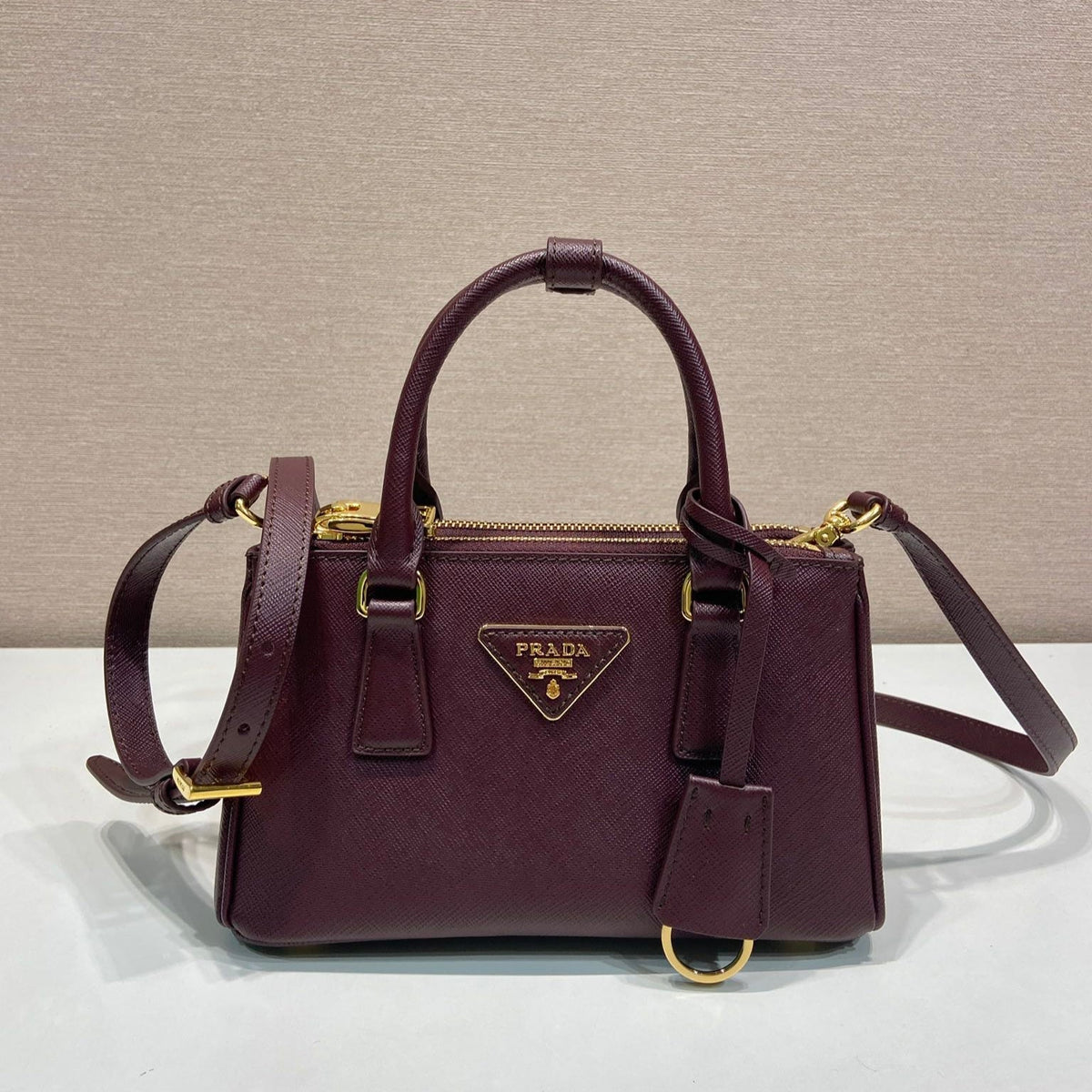 Pr*a Galleria handbag 21 burgundy leather