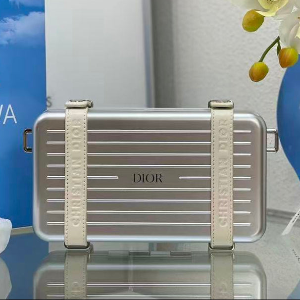 R*mowa x D*or Personal Cross-body Bag Silver Aluminum