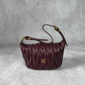 M*u Matelassé Pouch Bag Leather