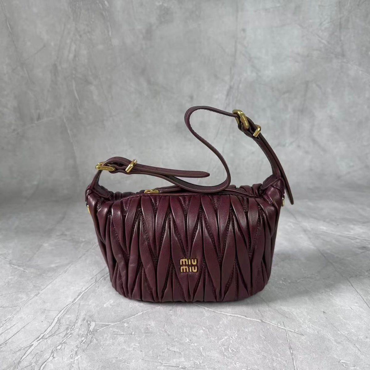 M*u Matelassé Pouch Bag Leather