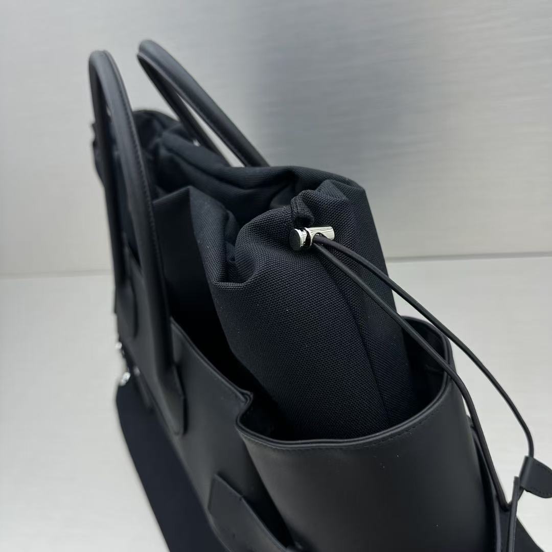 The R*w Margaux 17 Inside Out Black Canvas & Leather