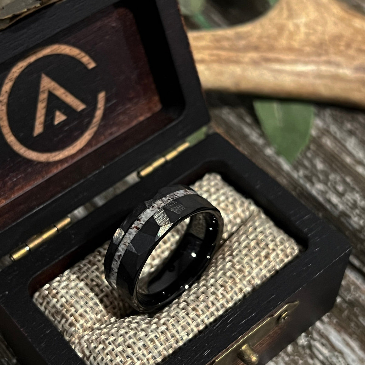 The Dark Elk: Deer antler hammered Tungsten facet wedding ring band