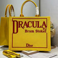 D*or 2026 Book Tote with Strap Yellow and Red Book Cover Embroidery