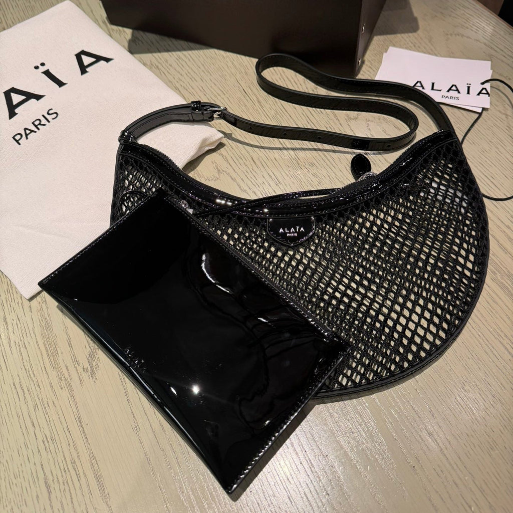 ONE PIECE DEMI LUNE BAG 31 IN BLACK FISHNET