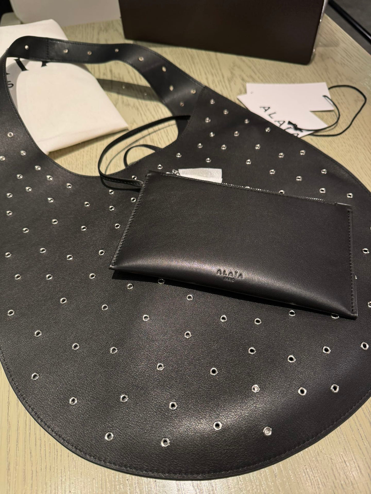 ONE PIECE MEDIUM BAG 39 IN BLACK SHEEPSKIN EYELET DETAILING