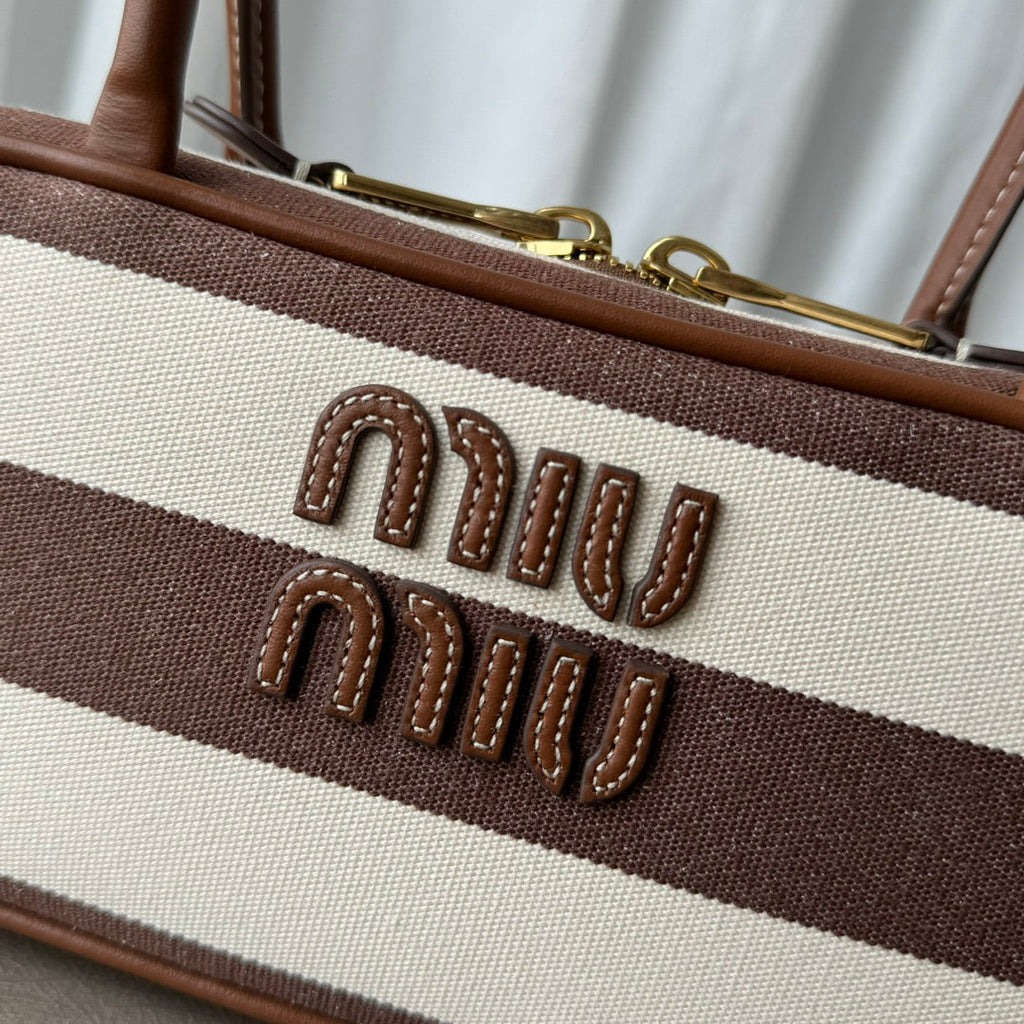 M*u*M*u shoulder bag striped canvas