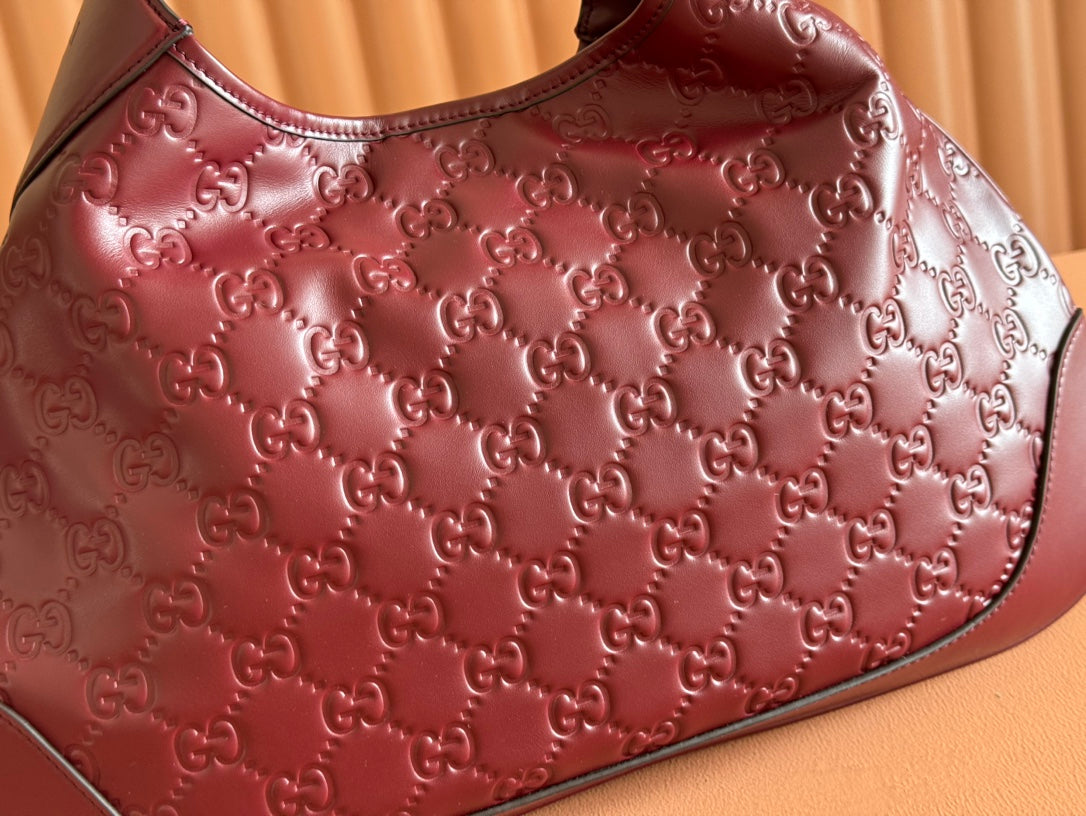 G*cci Body Double Lock Handbag Embossed Leather