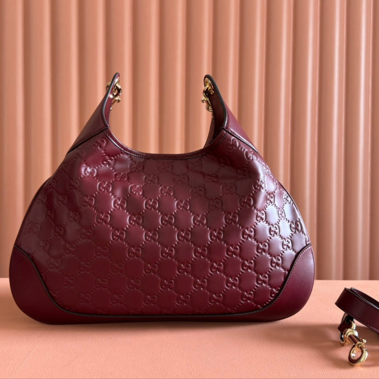 G*cci Body Double Lock Handbag Embossed Leather